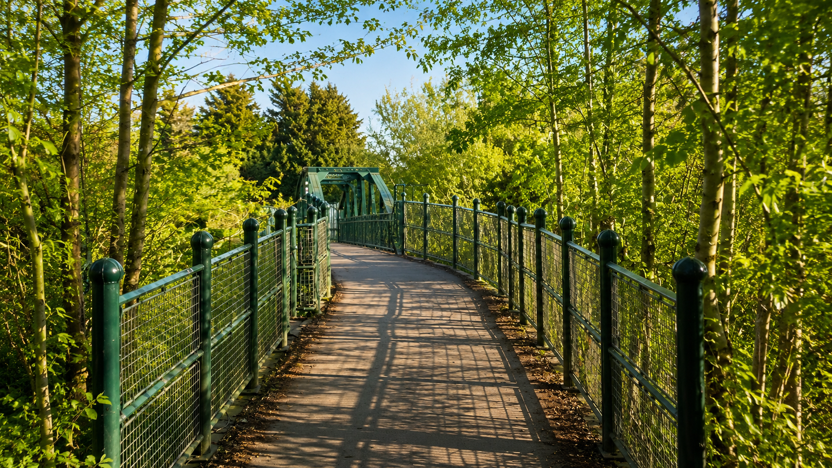 green bridge crossing the river cam on a spring afternoon.